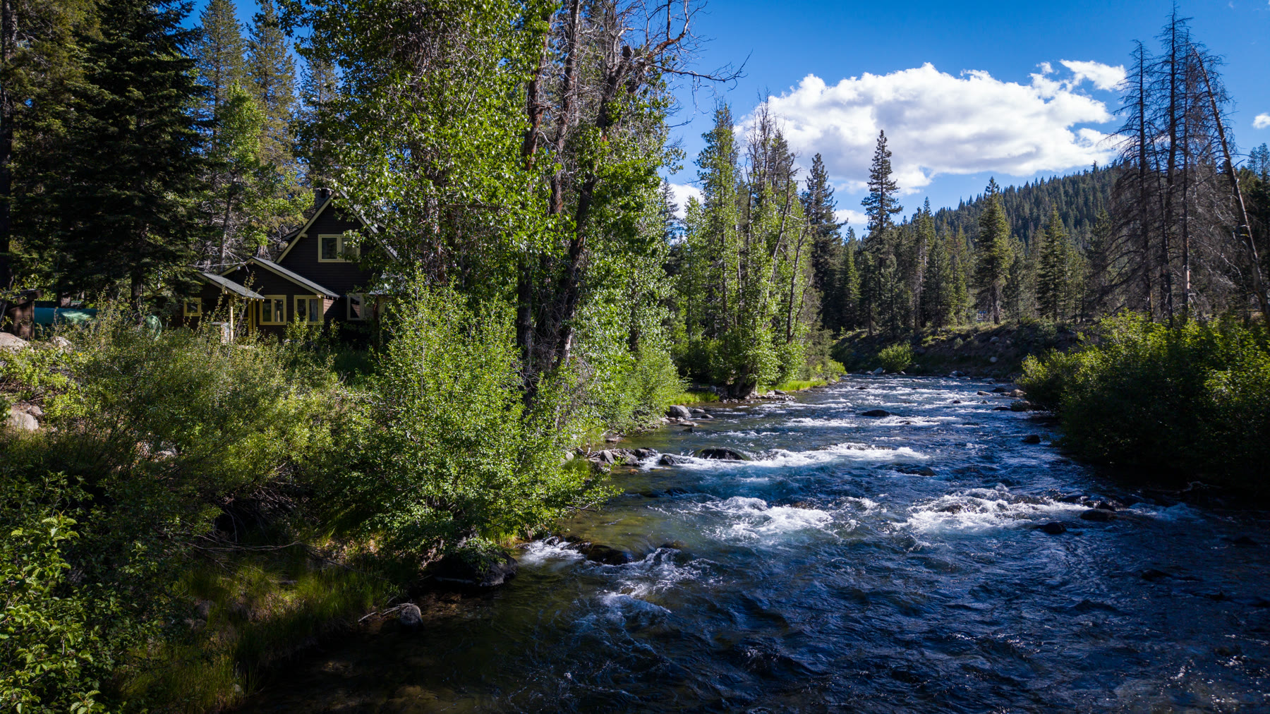 The main residence viewed across the Truckee River